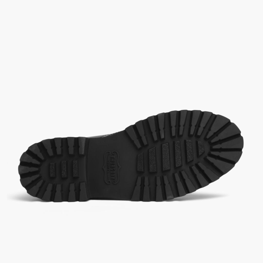 High-Traction Rubber Outsole & Lug Tread Pattern on Captain Noir (StormKing® Édition) Bottines en cuir pour Femme