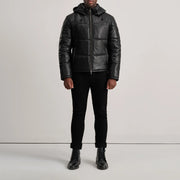 
Gordon Tan Hooded Leather Puffer Jacket - Vue de profil mettant en valeur la coupe de manche ergonomique