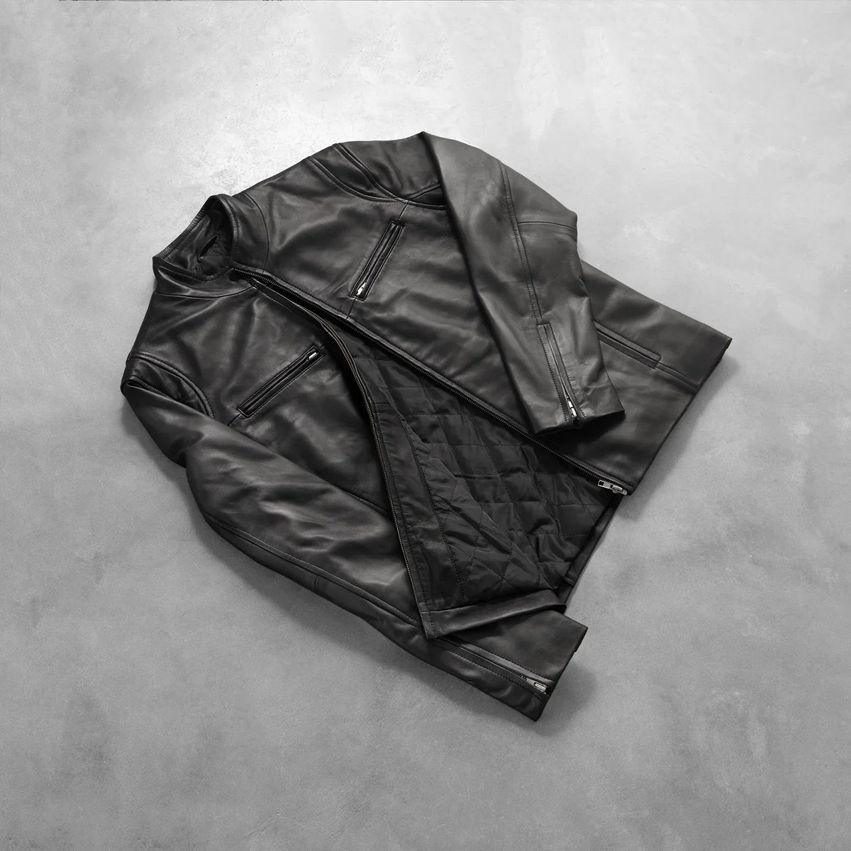 Styled Fit Perspective of Men's Ionic Black Leather Jacket on Model - Natural Daylight Drape