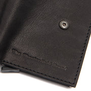 
Solid Antique Brass Hardware & Heavy-Duty Dual Zipper Detail on Torola Cuir Pleine Fleur Porte-cartes