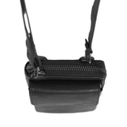 Styled Fit Perspective of Malaga Full-Grain Leather Phone Bag pour Femme on Model - Natural Daylight Drape