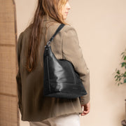
Classic 100% Full-Grain leather Bag - Perspective arrière montrant les bretelles en cuir renforcées