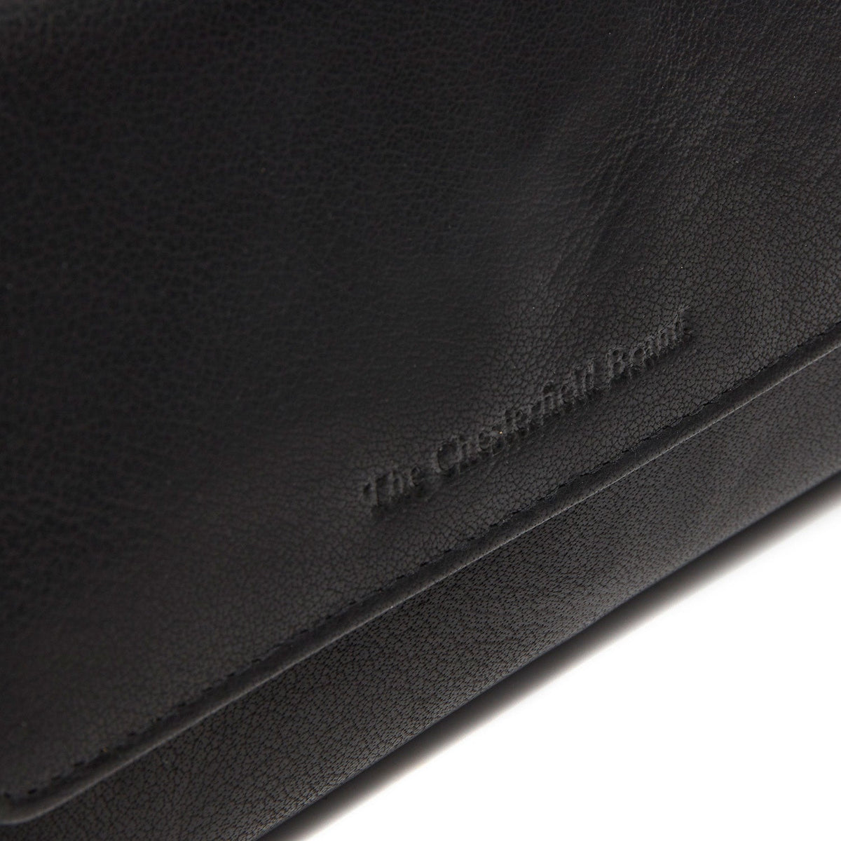 
Solid Antique Brass Hardware & Heavy-Duty Dual Zipper Detail on Rhodos Portefeuille en cuir pleine fleur
