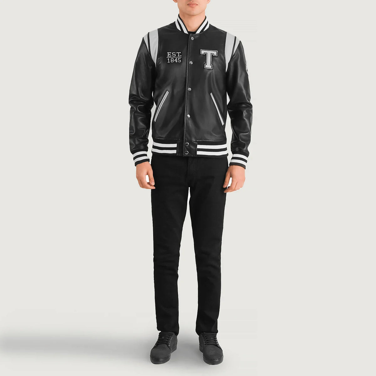 Liberte Texas Noir Leather Varsity Veste en Cuir pour Homme - Vue de profil avec coupe de manche ergonomique