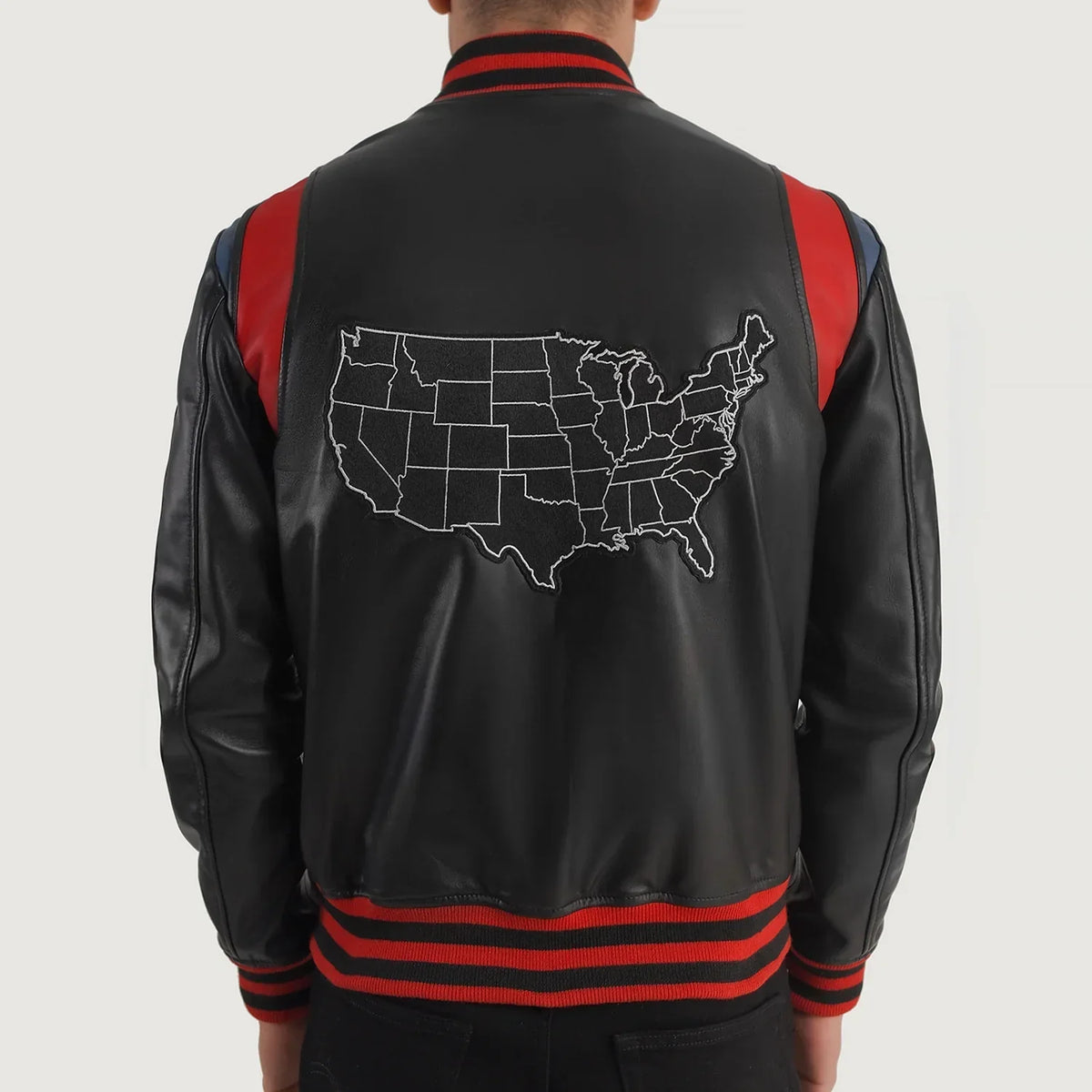 Liberte USA Black Leather Varsity Jacket - Vue de profil avec coupe de manche ergonomique