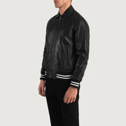 
Perspective portée de Walton Blue Leather Varsity Jacket sur modèle - Tombé naturel à la lumière du jour